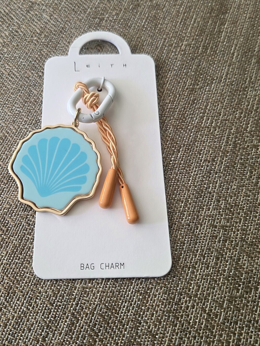 Leith Turquoise Shell Keychain with Orange Tassel and Gold Trim